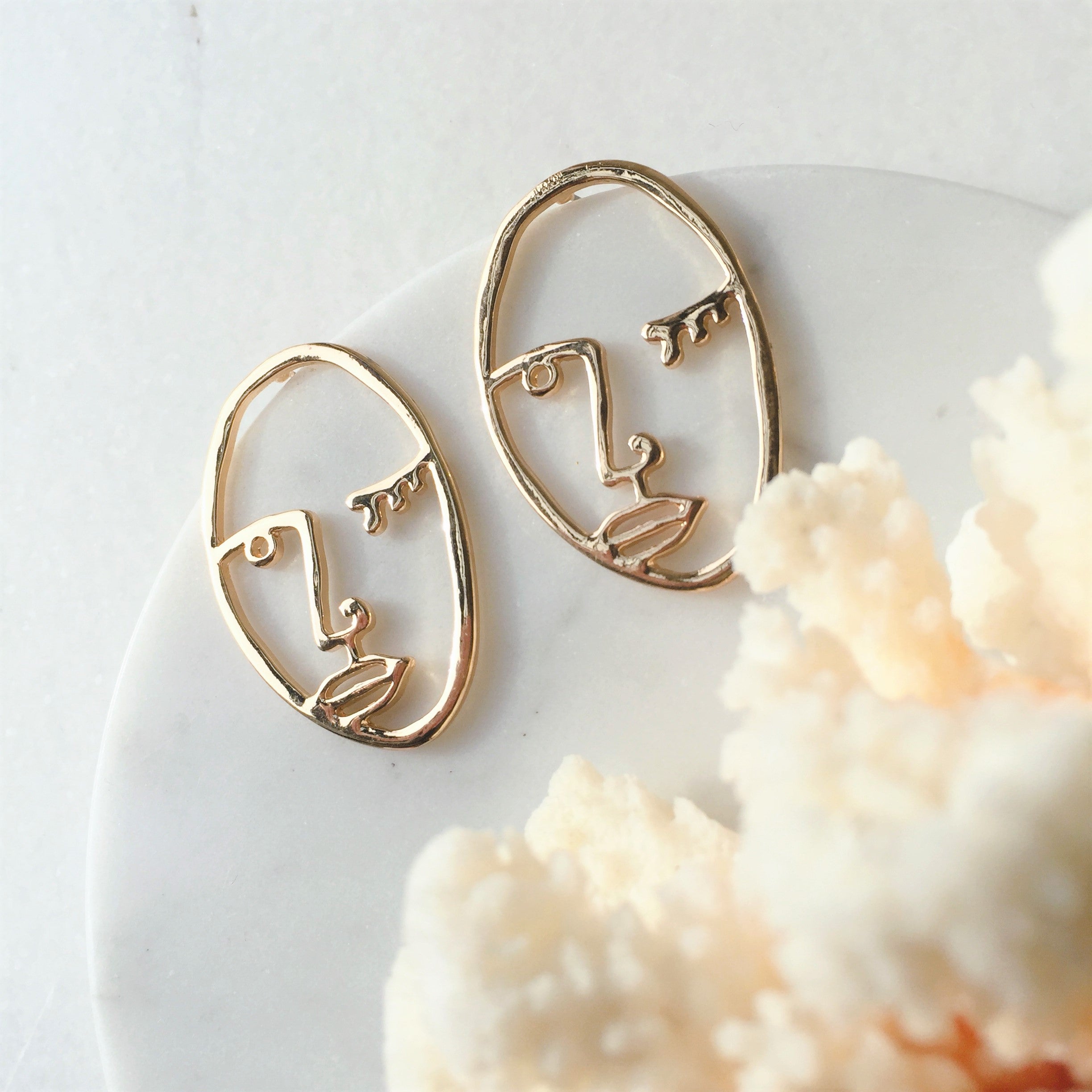 Facess II earrings