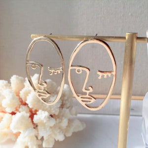 Facess II earrings