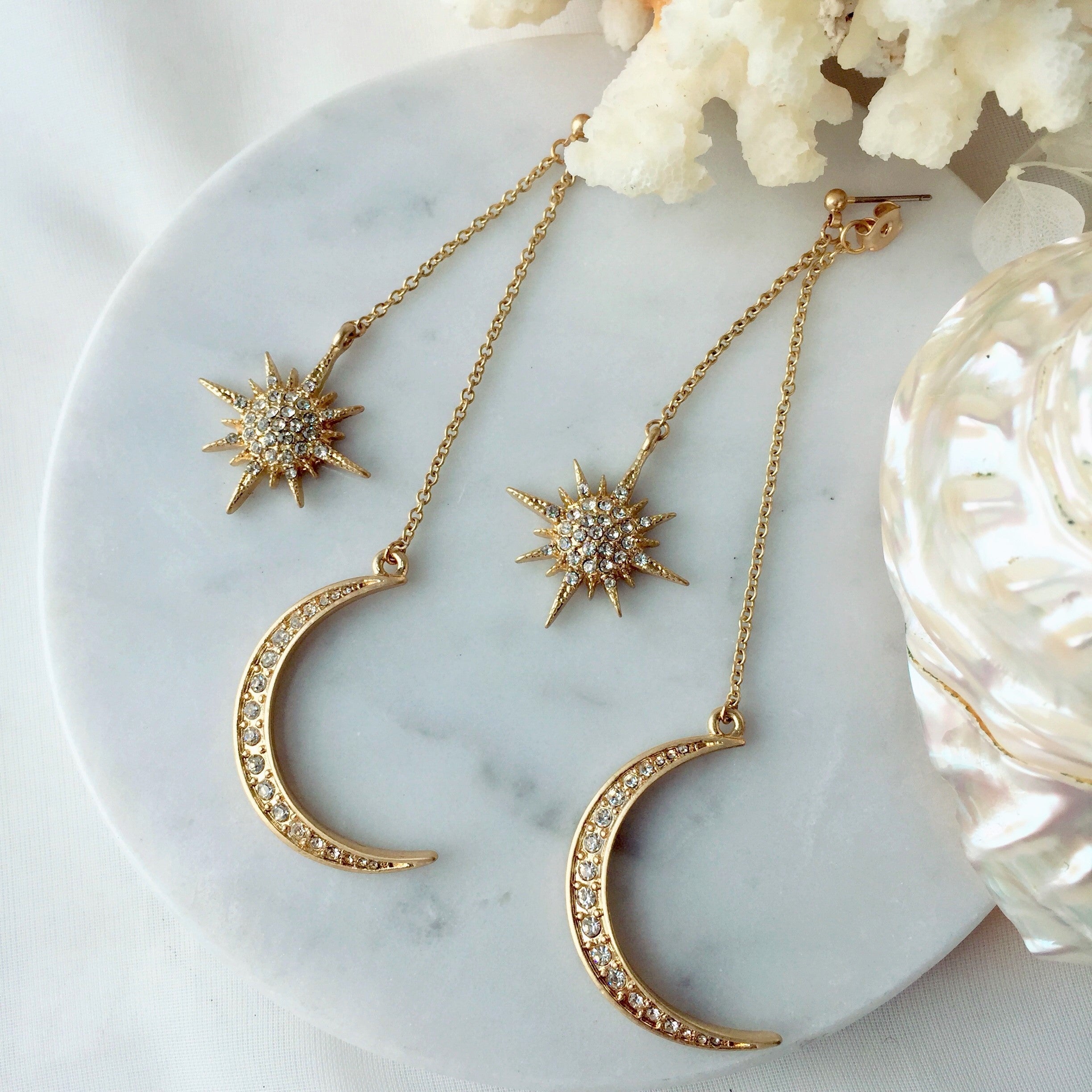 Moonglow earrings and necklaces collection